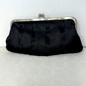 Carolina Herrera kiss lock black and silver clutch